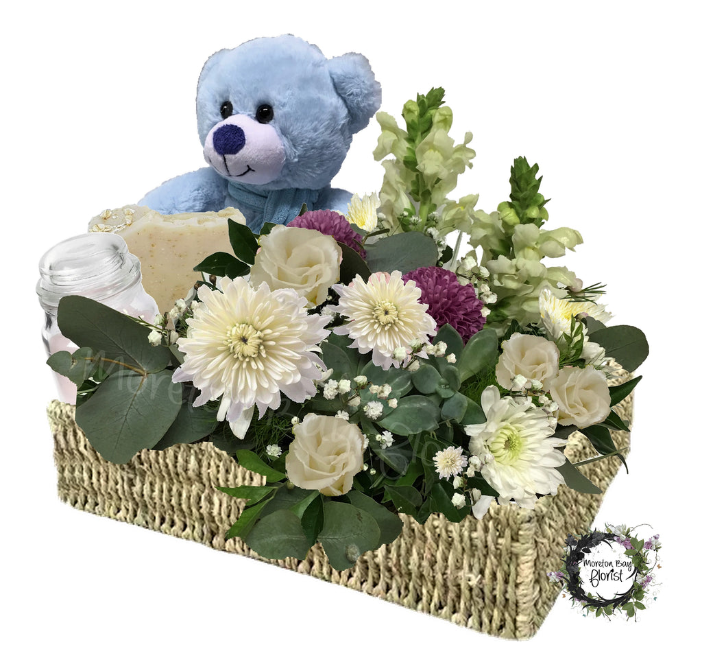 Flower basket with teddy bear, soap and candle for baby boy